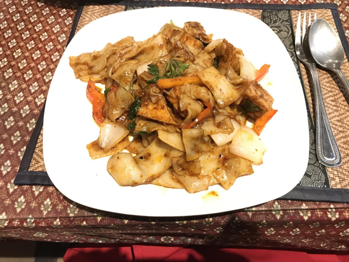 This dish, called Pad Kee Mao, is a popular one for students to eat at Soi 2. Rice noodles infused with basil are a delicacy in Thailand. Diners can enjoy it with a glass of milk tea. Photo Credit to Tejas Gokhale

