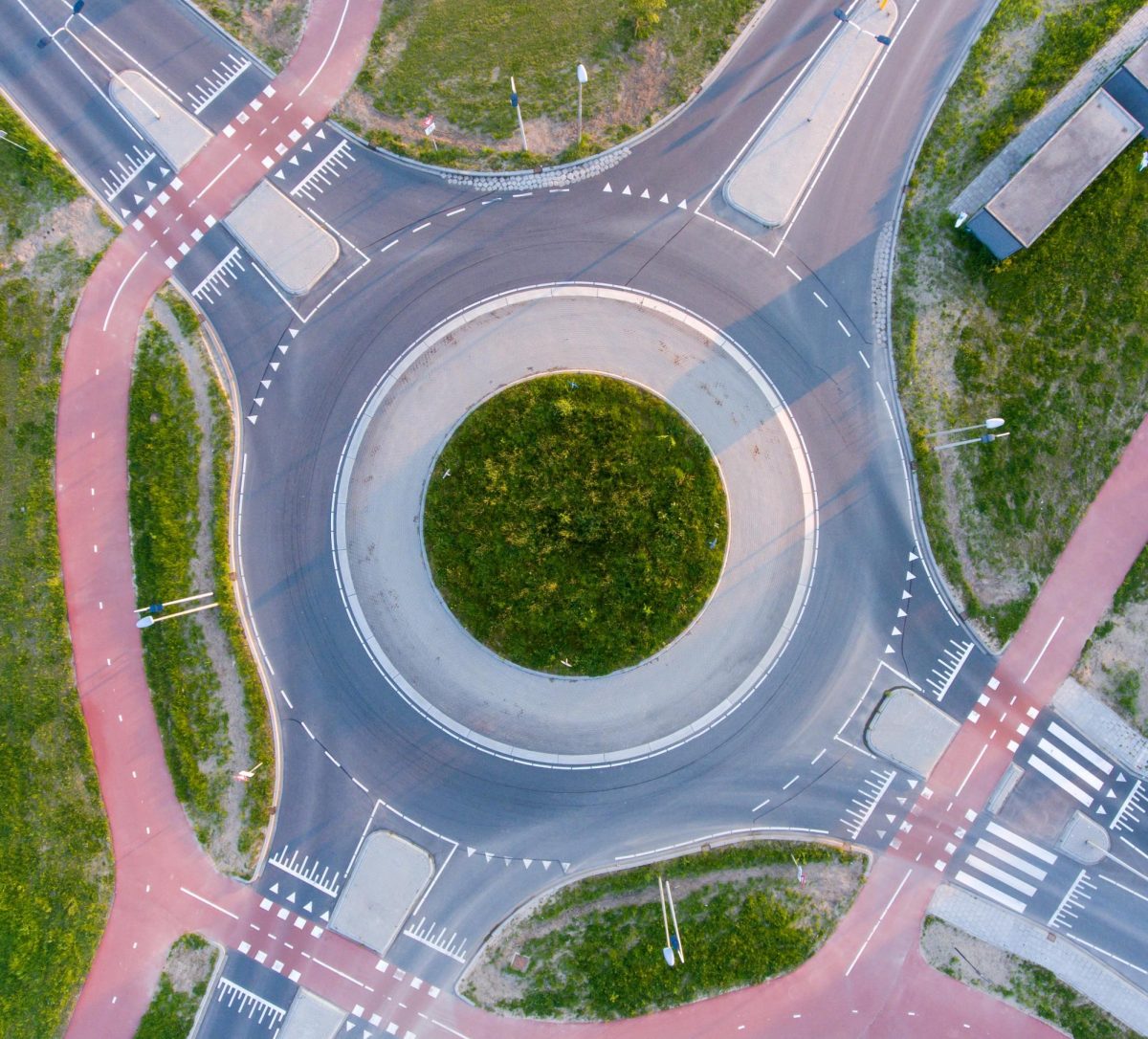 Roundabouts should replace traffic lights. 

Photo Credit to Freepik

