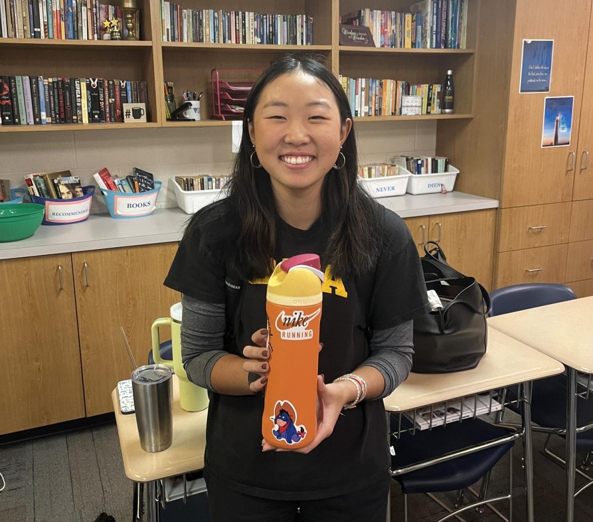 Senior Becca Hahm with her water bottle is an anomaly among young people and Americans, who lack sufficient hydration.

