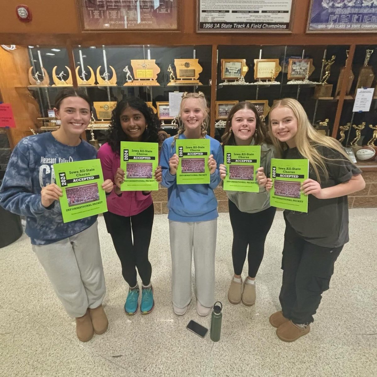 Some accepted Pleasant Valley chorus students are pictured after seeing the results and getting their All-State acceptance folders. 

Photo Credit: Alex Nash