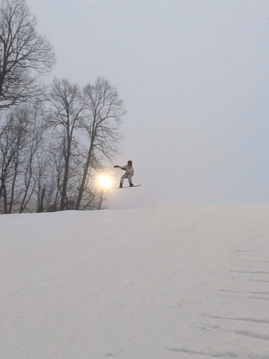 Riley Rashka skis through the scenic trails of Northern Wisconsin, embracing the thrill of winter sports.
