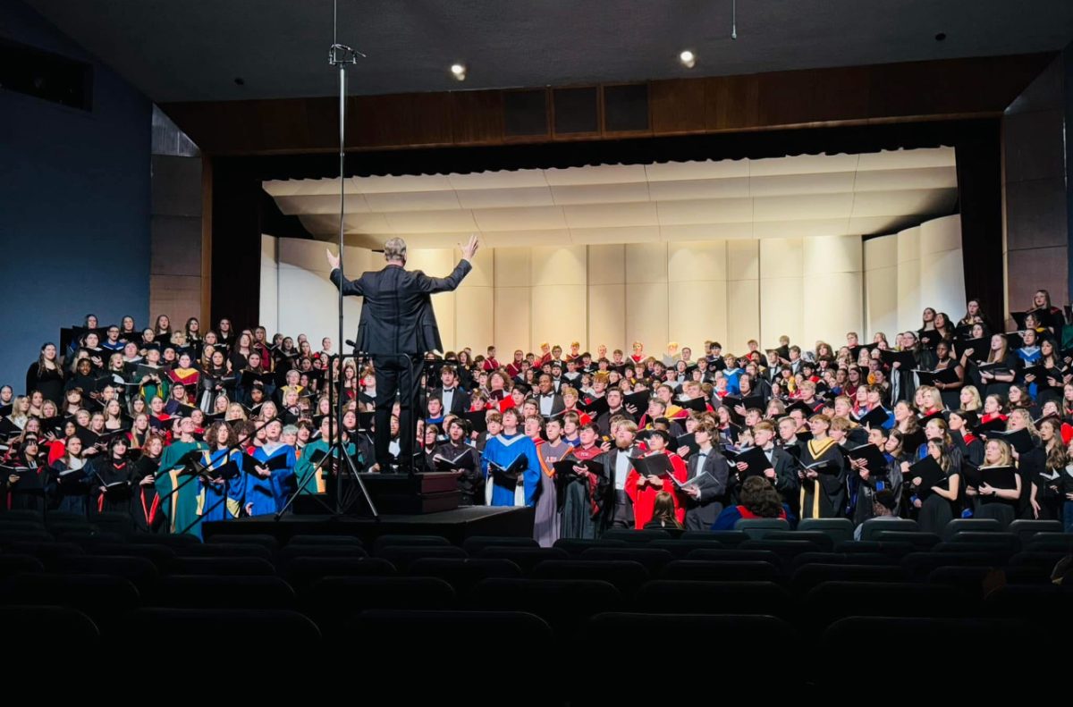 Dr. Lee Nelson Conducts the 400+ member 2025 Meistersinger Honor Choir in Neumann Auditorium.
Photo Credit: Pleasant Valley High School Choir