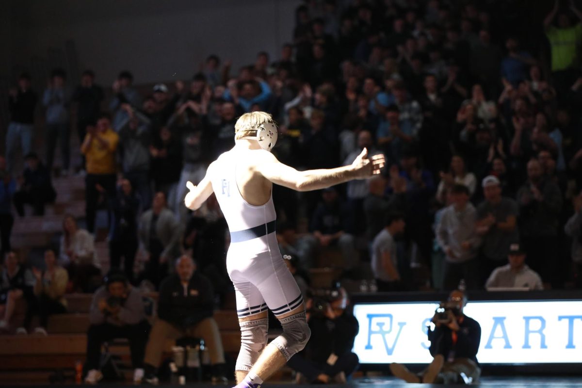 Senior Carter Siebel wins at Boy's Wrestling Qualifiers.