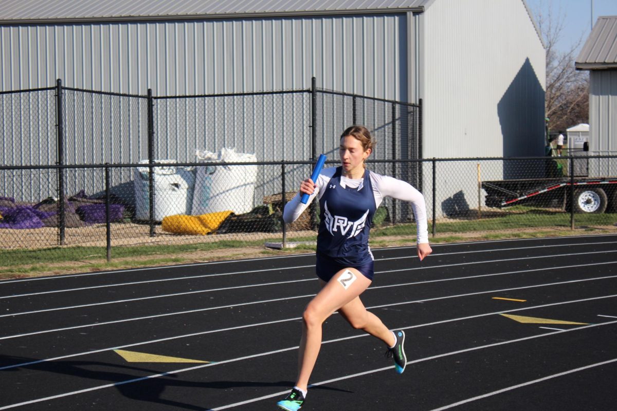 Throwing it back to 2024 Varsity runner, Caitlin Quinn, is pictured competing at Muscatine. The girl’s team dominated in season meets last year before going on to win the state meet.