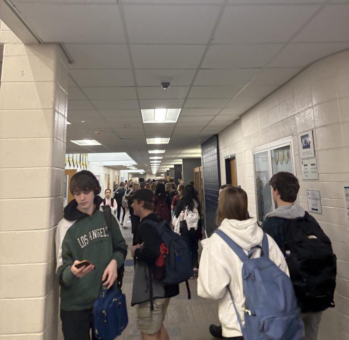 Students fill the halls amidst the chaos of passing period. 