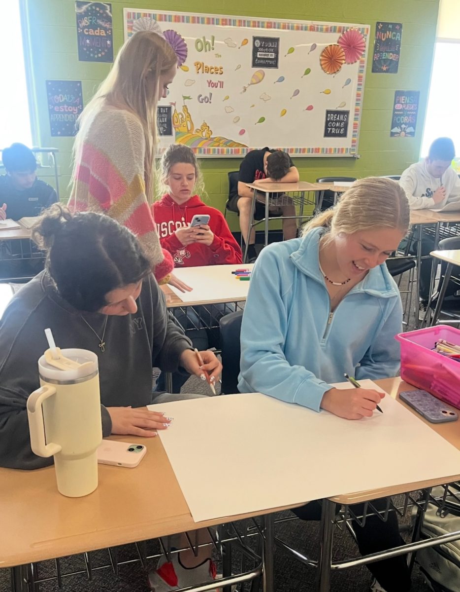 Social Committee members work on posters to advertise this year’s Prom dance.